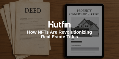 A flat lay image showing old paper property deeds on the left side of a wooden desk and a digital tablet on the right displaying a property ownership record with a house photo, representing the shift from traditional titles to NFTs in real estate.
