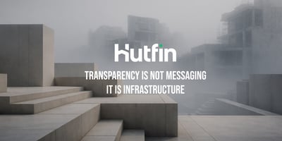 Modern concrete architectural forms emerging through fog, representing transparency built into structural design rather than surface-level communication.