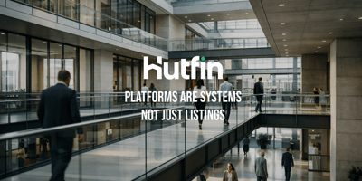 Professionals walking through interconnected levels of a modern office building, illustrating structured movement and coordination.