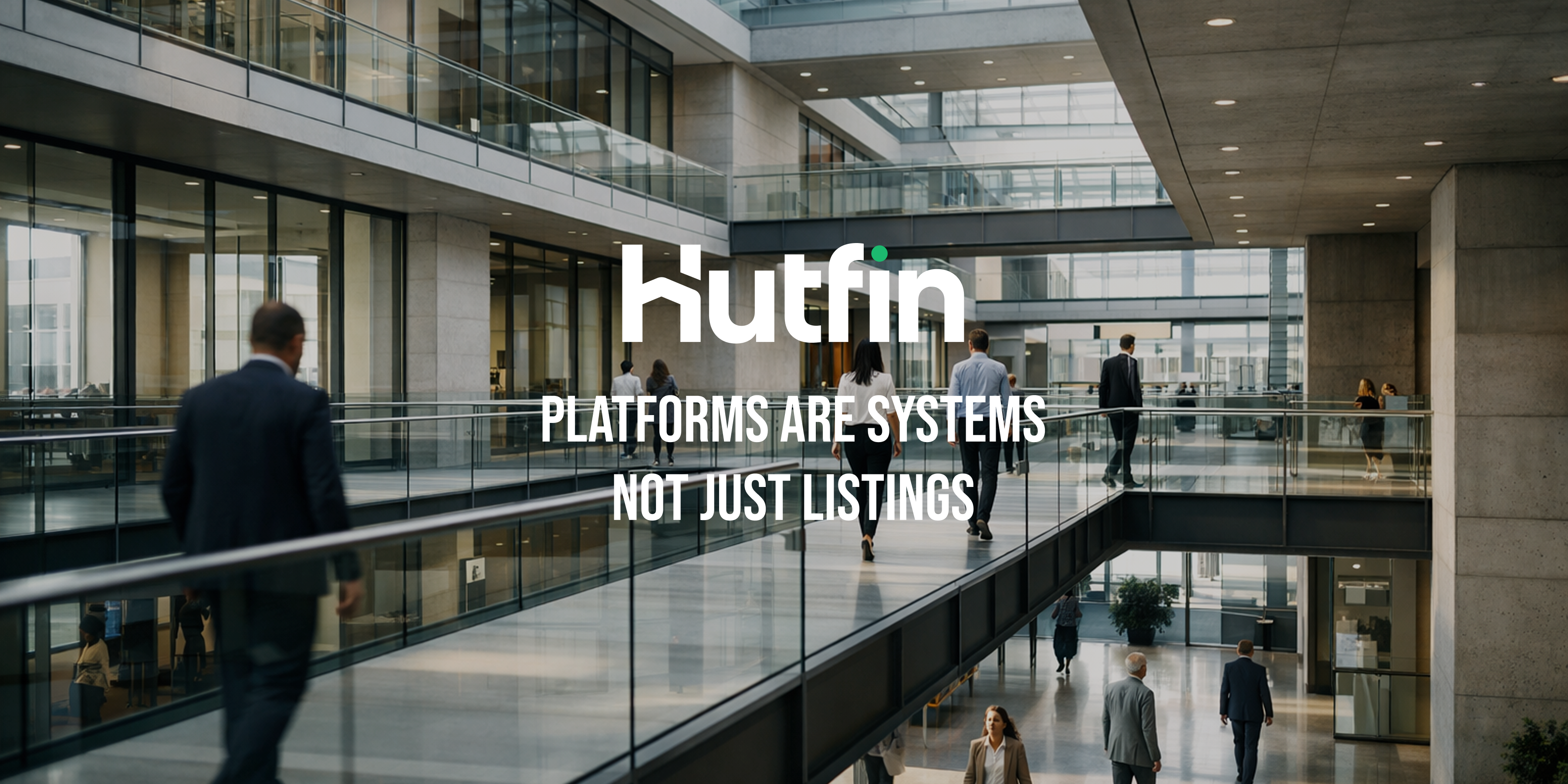 Professionals walking through interconnected levels of a modern office building, illustrating structured movement and coordination.