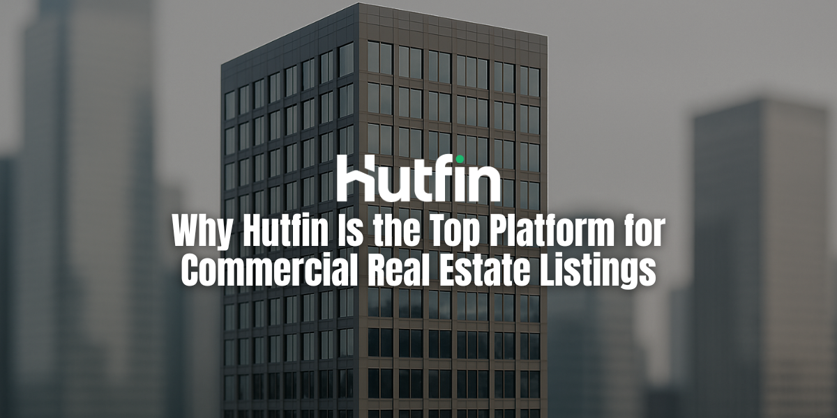 A modern commercial high-rise stands sharply in focus while the surrounding cityscape fades softly into blur, creating a clean spotlight effect on the building.