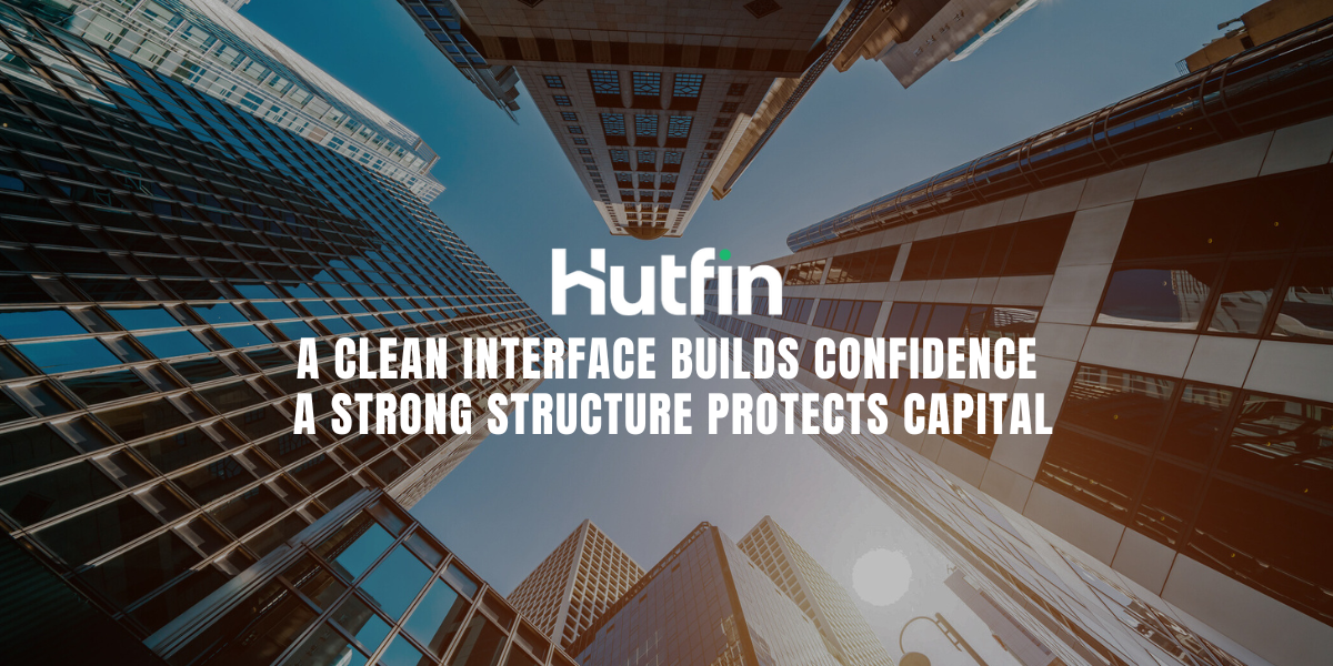 Upward view of modern commercial office buildings forming a symmetrical skyline, representing structural strength and confidence in real estate infrastructure.